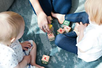 Children playing with building blocks 