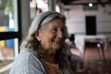 An older woman smiling 