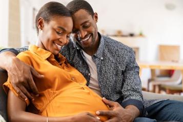 a pregnant woman and her partner 
