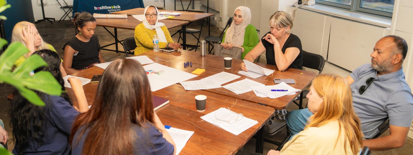 a group of people in discussion