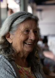 An older woman smiling 